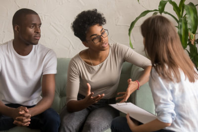 family couple counseling have conversation about problem at therapy session